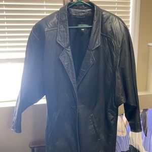 Black leather jacket by Danier.  In great shape . Has shoulder pads